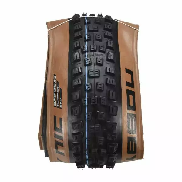Pneu SCHWALBE NOBBY NIC 27,5x2,40 Super Ground Addix Speedgrip Bronze Skin Tubeless Ready Souple 11654206.01 3 Pneu SCHWALBE NOBBY NIC 27,5x2,40 Super Ground Addix Speedgrip Bronze Skin Tubeless Ready Souple 11654206.01