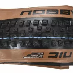 Pneu SCHWALBE NOBBY NIC 27,5x2,40 Super Ground Addix Speedgrip Bronze Skin Tubeless Ready Souple 11654206.01 9 Pneu SCHWALBE NOBBY NIC 27,5x2,40 Super Ground Addix Speedgrip Bronze Skin Tubeless Ready Souple 11654206.01 -Pneus VTT 26" Soldes Magasin 600x600 256231 16255773761037 1